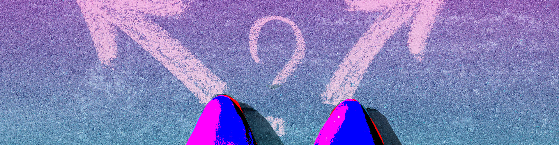 Pair of feet in pointed shoes standing on concrete with chalk arrows and question mark drawn on the ground