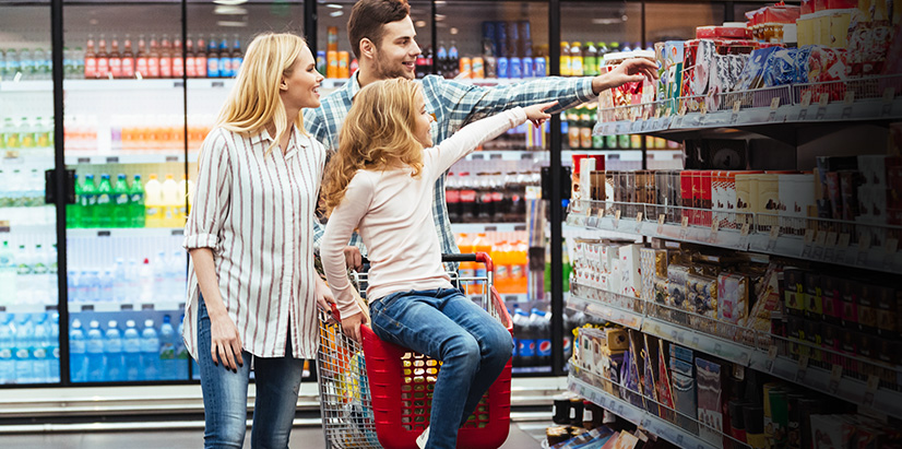 Value 8 Image featuring two parents shopping at a grocery store with their young daughter