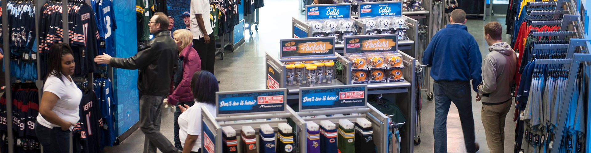 Banner featuring busy NFL merchandise store